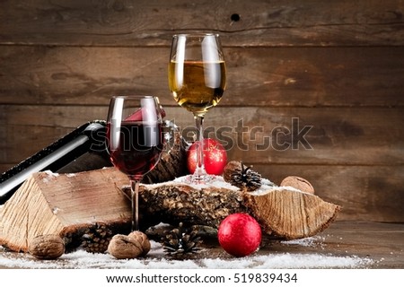 Red and white Xmas wine on wood