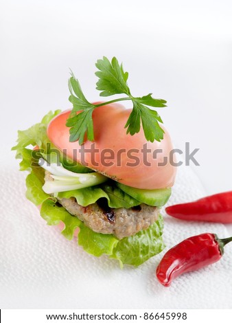 Low carbohydrate tomato burger with red chilly peppers