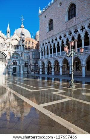Doge\'s Palace and church San Marco with flood on the St. Mark\'s square