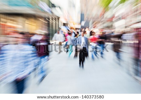 Picture In Zoom Effect Of People In The Shopping Street Of The City