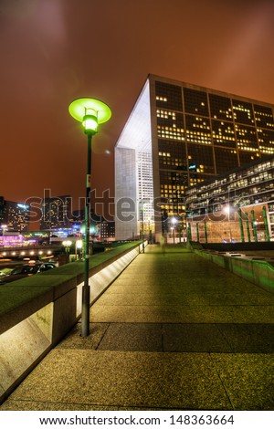 PARIS - NOVEMBER 14: view of the financial district La Defense and the famous building Grand Arche at night on November 14, 2012 in Paris.