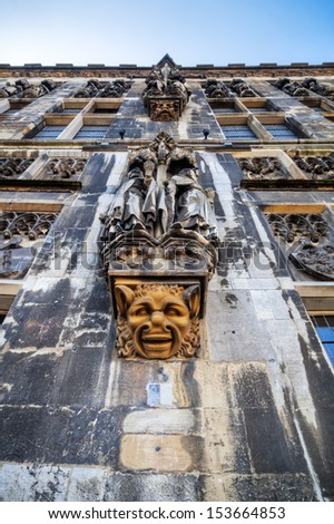 facade of the the famous town hall of Aachen with a grotesque face sculpture
