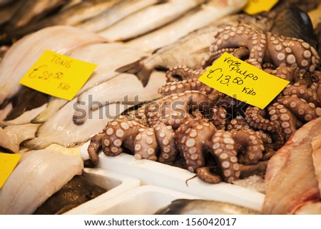 octopus and common sole at a market stall