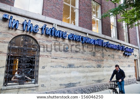 ROTTERDAM, NETHERLANDS - SEPTEMBER 20: quote of Andy Warhol at a wall on September 20, 2013 in Rotterdam. Famous quote \
