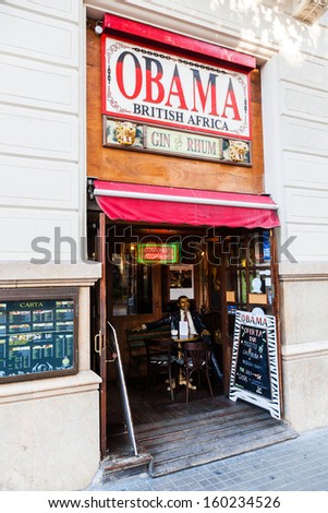 BARCELONA, SPAIN - OCTOBER 12: Irish Pub on October 12, 2013 in Barcelona. The name of the stylish pub is Obama British Africa with a figure of Barack Obama in the entrance.
