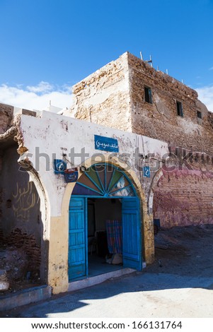 ESSAOUIRA, MOROCCO - NOVEMBER 18: traditional phone booth in a run down building on November 18, 2013 in Essaouira. The old town of Essaouira is completely protected by the UNESCO world heritage.