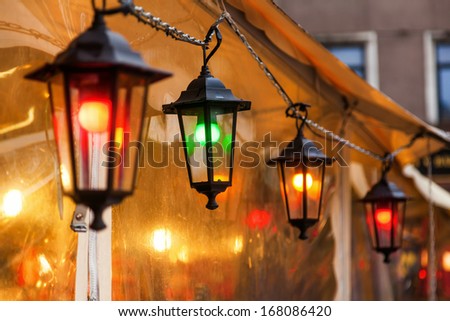 colorful lanterns at a tent of a christmas market