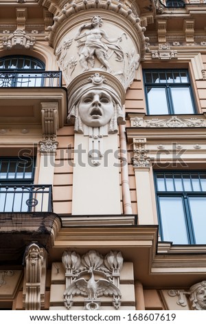 great art nouveau reliefs at a house facade in the old town of Riga, Latvia
