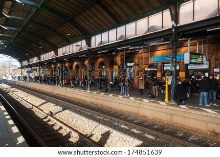 BONN, GERMANY - JANUARY 31: main station with unidentified people on January 31, 2014 in Bonn. At the main station stopping 70 long distance and 164 short distance trains, with daily 40.000 passengers