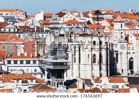 LISBON, PORTUGAL - MAY 04: aerial view with unidentified people on May 04, 2013 of Lisbon. The elavator Santa Justa  and the Convento do Carmo, which was ruined 1755 by a an earthquake, are seen.