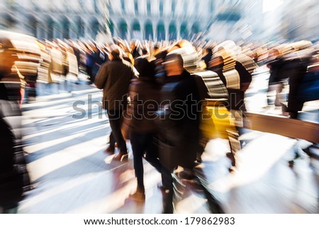 crowd of people on the cathedral square in Milan with creative zoom effect