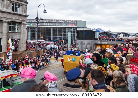 COLOGNE, GERMANY - MARCH 03, 2014: unidentified crowd of people at the Rose Monday parade on March 03, 2014 in Cologne. The Rose Monday parade in Cologne is the largest one in Germany.