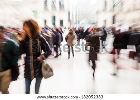 crowds of people in the city with creative zoom effect