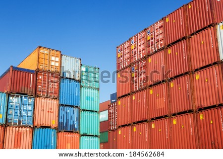 HAMBURG, GERMANY - MARCH 10: container in the container harbor on March 10, 2014 in Hamburg. The harbor of Hamburg is the largest sea harbor in Germany and under the 20 largest harbors of the world.