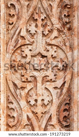 background texture of an old ornamental relief of an old wall in Verona, Italy