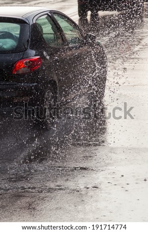 driving car on a wet street