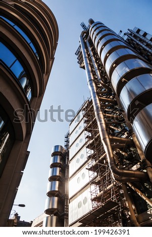LONDON - MAY 18: Lloyds Building on May 18, 2014 in London. The modern and exceptional Lloyd\'s building, located in the City of London, was designed by architect Richard Rogers and completed in 1986