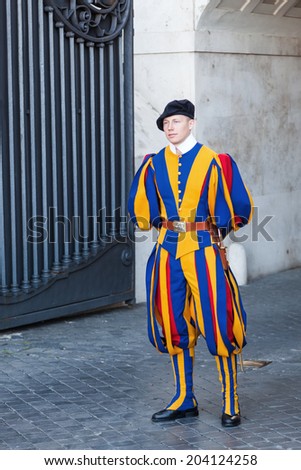 ROME - JULY 01: unidentified member of the Pontifical Swiss Guard on July 01, 2014 in Rome. It is a force responsible for the safety of the Pope the Apostolic Palace and it is the military of Vatican