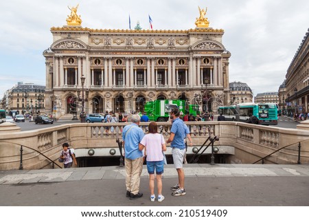 PARIS - AUGUST 04: Palais Garnier with unidentified people on August 04, 2014 in Paris. It was built from 1861-1875 for the Paris Opera. The Paris Opera now mainly uses the Palais Garnier for ballet