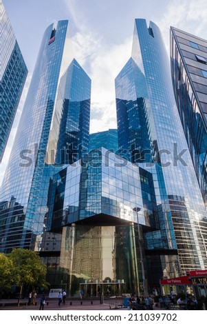 PARIS - AUGUST 05: district La Defense with unidentified people on August 05, 2014 in Paris. It is Europes largest business district with 560 hectares area 72 glass and steel buildings and skyscrapers