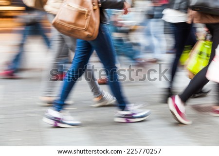 intentional motion blur picture of walking people the pedestrian zone of a city