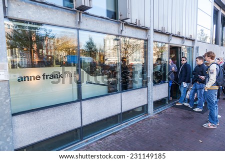 AMSTERDAM, NETHERLANDS - NOVEMBER 13: Anne Frank House with unidentified people on November 13, 2014 in Amsterdam. Its a biographical museum dedicated to Jewish wartime diarist Anne Frank