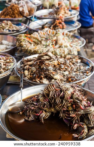 food stall with crabs and other seafood in Chinatown, Bangkok, Thailand