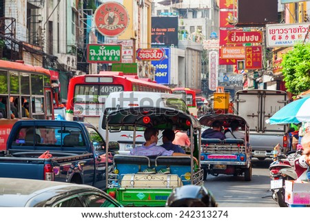 BANGKOK, THAILAND - DECEMBER 12, 2014: street scene in Chinatown with unidentified people. Chinese began settling in the Bangkoks Chinatown circa 1800s, it is a famous tourist attraction