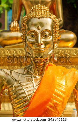 BANGKOK, THAILAND - DECEMBER 12, 2014: golden Buddha at Wat Suthat, a royal temple of first grade, one of ten such temples in Bangkok -23 in Thailand-. Construction was begun by King Rama I in 1807