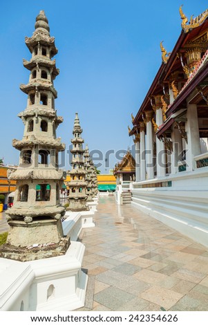 BANGKOK, THAILAND - DECEMBER 12, 2014: Wat Suthat that is a royal temple of first grade, one of ten such temples in Bangkok -23 in Thailand-. Construction was begun by King Rama I in 1807