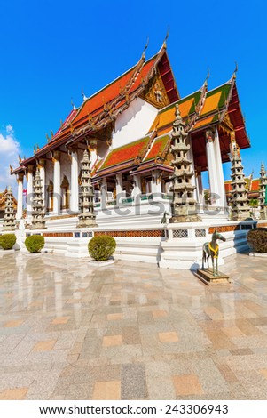 ANGKOK, THAILAND - DECEMBER 10, 2014: Wat Suthat that is a royal temple of first grade, one of ten such temples in Bangkok -23 in Thailand-. Construction was begun by King Rama I in 1807
