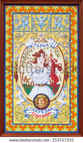 VALENCIA, SPAIN - FEBRUARY 07, 2015: old advertisement of Cruzcampo beer on tiles. Cruzcampo is considered to be the biggest beer producer in Spain, founded in 1904 by Roberto and Agustin Osborne