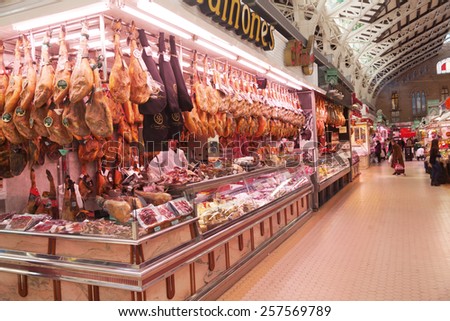 VALENCIA, SPAIN - FEBRUARY 10, 2015: market hall Mercado Central with unidentified people. Built in architectural style of Modernisme its considered one of the oldest European markets still running