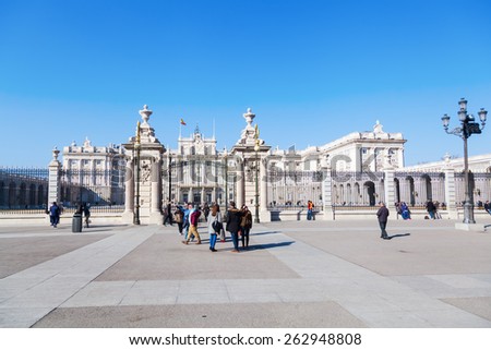 MADRID, SPAIN - MARCH 16, 2015: The Royal Palace of Madrid with unidentified people. Its the official residence of the Spanish Royal Family at the city of Madrid, but is only used for state ceremonies