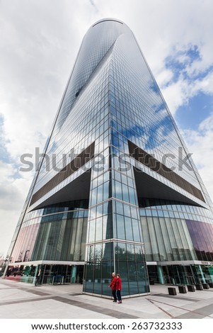 MADRID, SPAIN - MARCH 17, 2015: Torre Espacio in the Four Towers Business Area with unidentified people. The four towers are the tallest skyscrapers in Madrid and Spain