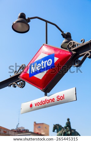 MADRID, SPAIN - MARCH 16, 2015: antique metro sign at the Puerta del Sol in Madrid. The Metro of Madrid is currently the fifth longest metro of the world with a network of 296 km.