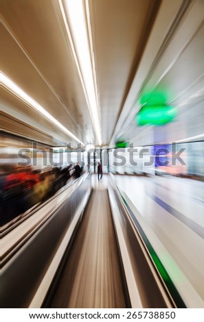zoom picture of a moving walkway at an airport, zoom effect was made by camera