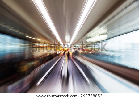 zoom picture of a moving walkway at an airport, zoom effect was made by camera