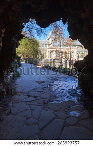 dark grotto in the Retiro Park in Madrid, Spain, with view to the Crystal Palace
