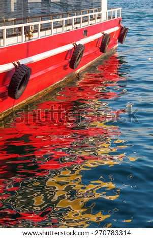 boat at the Golden Horn in Istanbul,Turkey, with reflecting water