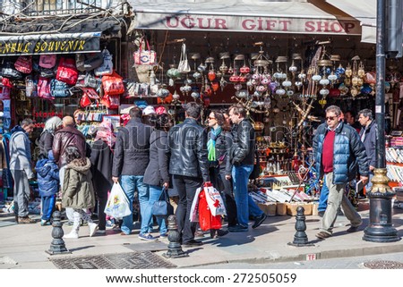 ISTANBUL, TURKEY - APRIL 10, 2015: crowds of unidentified people shopping in the old town of Istanbul. Istanbul is the largest city in Turkey and a famous travel destination