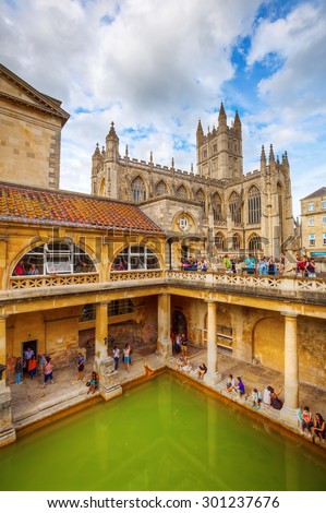 BATH, ENGLAND - JULY 04, 2015: inside of Roman Baths with unidentified people, which is a site of historical interest in the city of Bath. The house is a well-preserved Roman site for public bathing