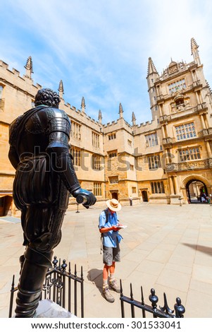 OXFORD, ENGLAND - JULY 03, 2015: Bodleian Library with unidentified people. Its one of the oldest libraries in Europe with over 11 million items and also a film location for Harry Potter and others