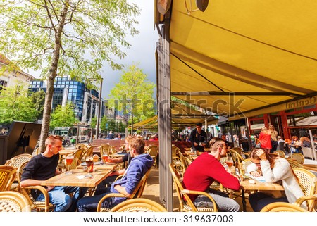 ANTWERP, BELGIUM - SEPTEMBER 03, 2015: street restaurant with unidentified people in Antwerp. Antwerp is the capital of Antwerp province and with a population of 510,610 most populous city in Belgium
