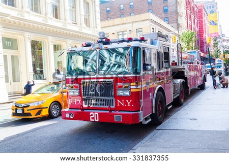 NEW YORK CITY - OCTOBER 06, 2015: ladder 20 fire truck in NYC. The New York City Fire Department is  the largest municipal fire department in the United States and the second largest in the world