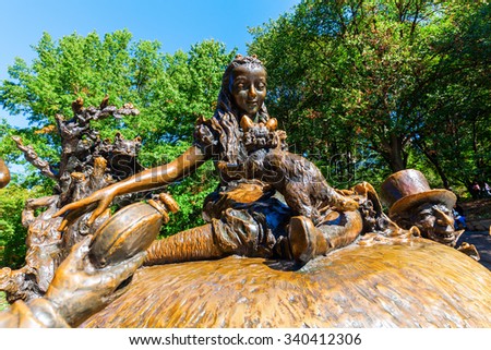 NEW YORK CITY - OCTOBER 07, 2015: Alice in Wonderland sculpture in Central Park, NYC. Designed by Jose de Creeft it depicts the chararacter of  Lewis Carrolls book Alices Adventures in Wonderland.