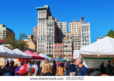 NEW YORK CITY - OCTOBER 10, 2015: farmers market on Union Square, NYC, with unidentified people. Union Square is an important and historic intersection and surrounding neighborhood in Manhattan
