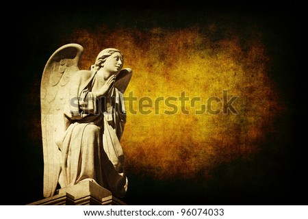 sculpture of an angel with an conceptual dark background
