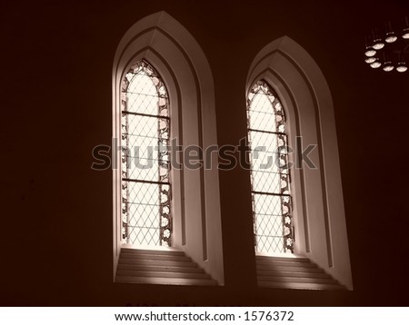 Church windows and bright sunshine outside. Domkirke - Bergen - Norway