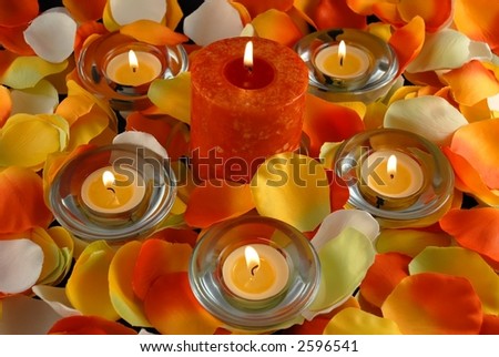 Scented candles and petals